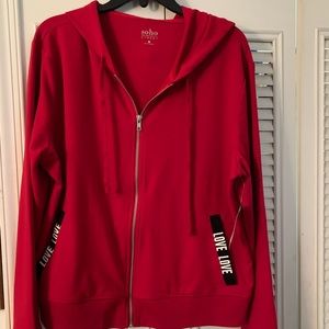 Zip front hooded jacket with the word love love on it. Comfortable and soft.